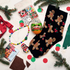 Christmas Craft Set. Beads making, phone charm, building blocks, black socks with gingerbread men design on a festive background with Christmas decorations.