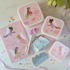 Set of pink fairy-themed lunch boxes, purse, pen and comb in a gift box.