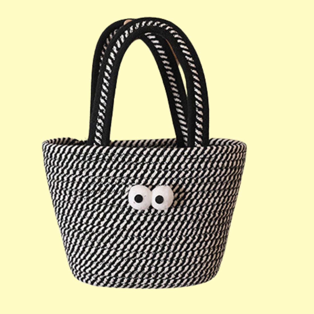 Betty - the Black and White Straw Bag with Eye Detail