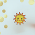 Smiley face sun pin badge