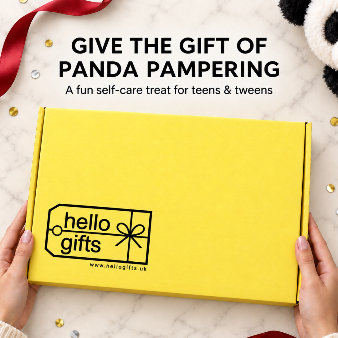 A bright yellow Hello Gifts box held by two hands on a white marble surface, with promotional text above reading &